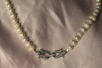 Front tie pearl necklace