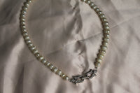 Front tie pearl necklace